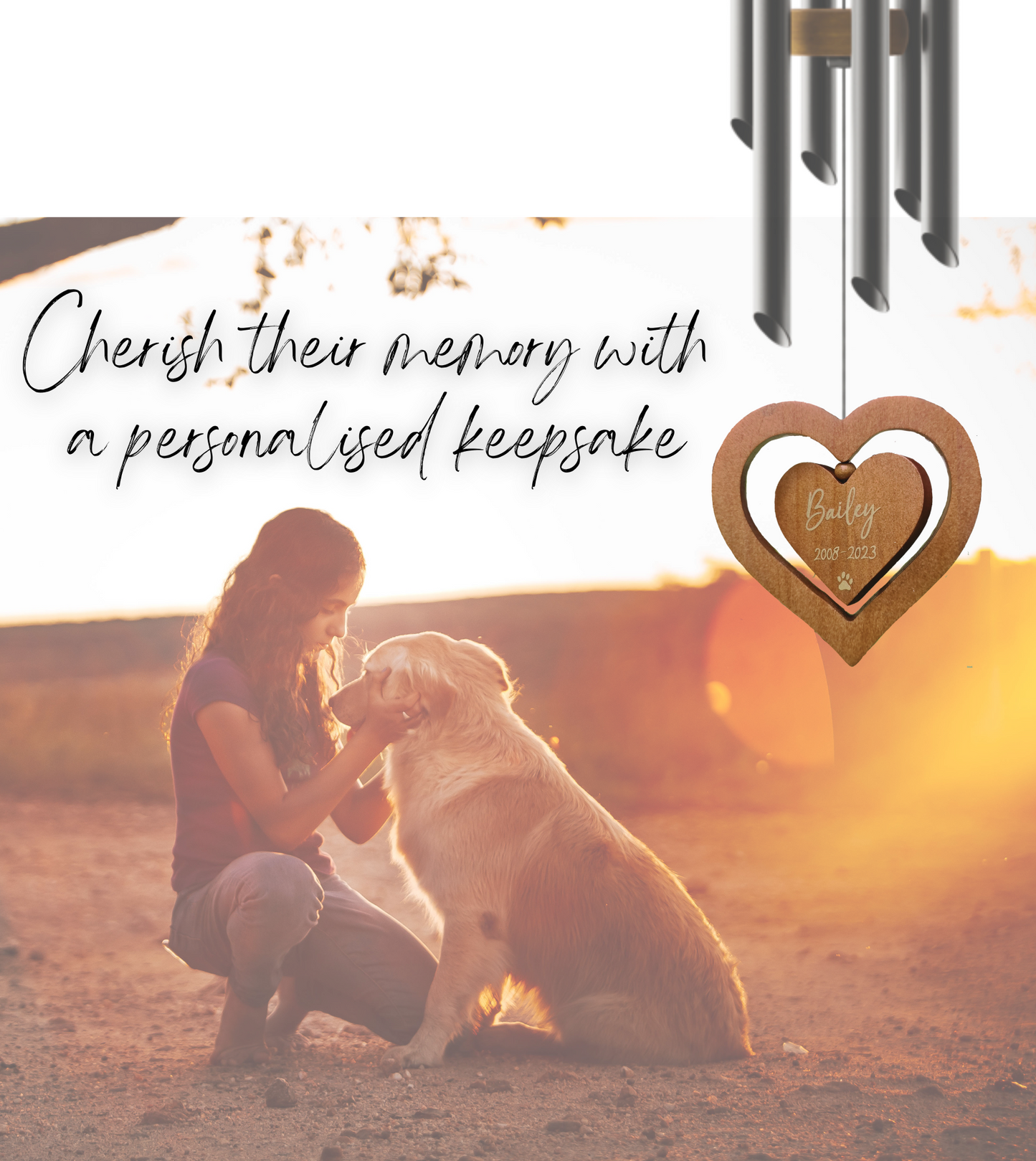 Woman kneeling with a dog, with a heart-shaped personalized keepsake in the foreground.