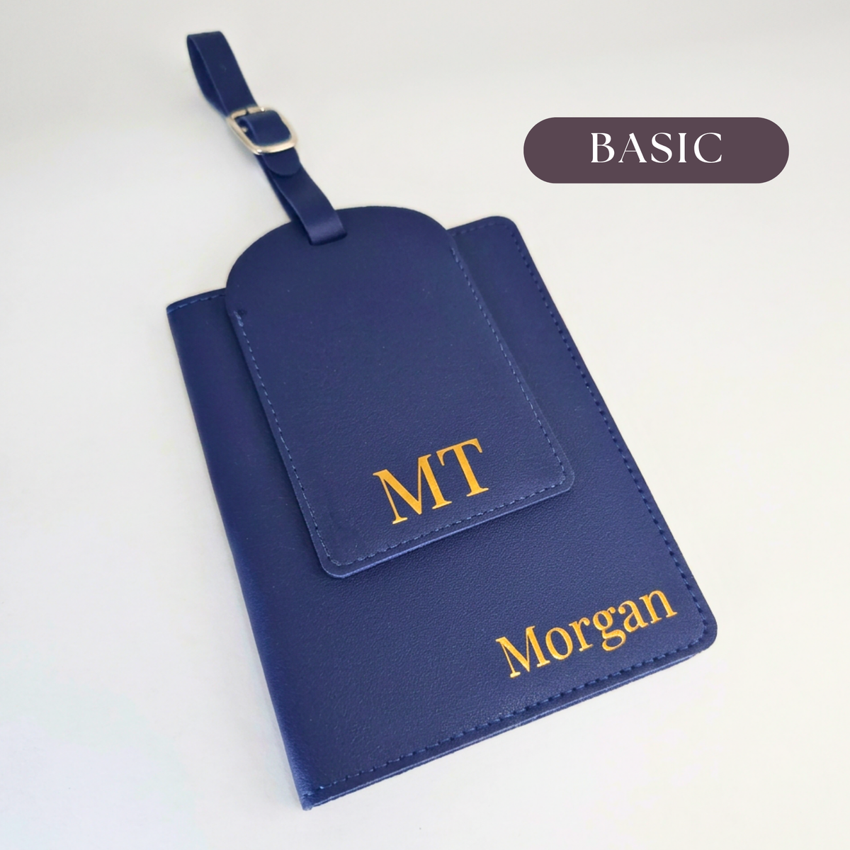 Dark Blue passport organiser with gold name Morgan and matching luggage tag with initials MT