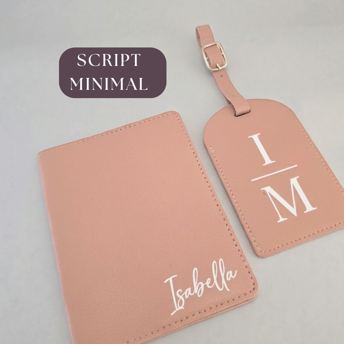 Pink passport organiser with white script name Isabella and matching luggage tag with initials IM